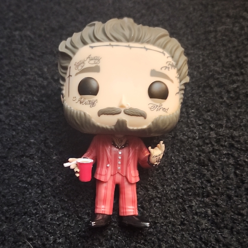Funko Pop Figure in Red Striped Suit